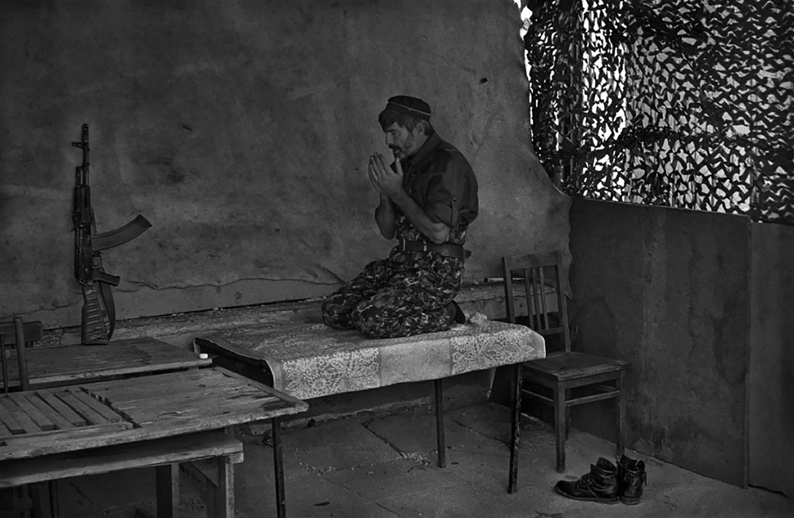 Chechen rebel in Grozny, Chechnya. 1999. Photo by Oleg Klimov.
